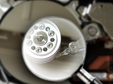 magnifying glass inspectiong a part